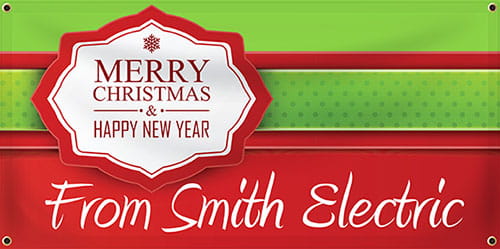 Merry Christmas Banner.  Banner top half is green, bottom half is red. There is a red ribbon like strip through the middle of the top green portion. The upper left quadrant has a gift tag shape with a red border and whit interior The red text in three lines reads "Merry" first, then beneath "Christmas" and beneath that "Happy New Year". Text in large white letters runs along the bottom half of the red portion and it reads "From Smith Electric".