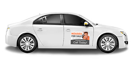 White car with a car magnet on the side door. 