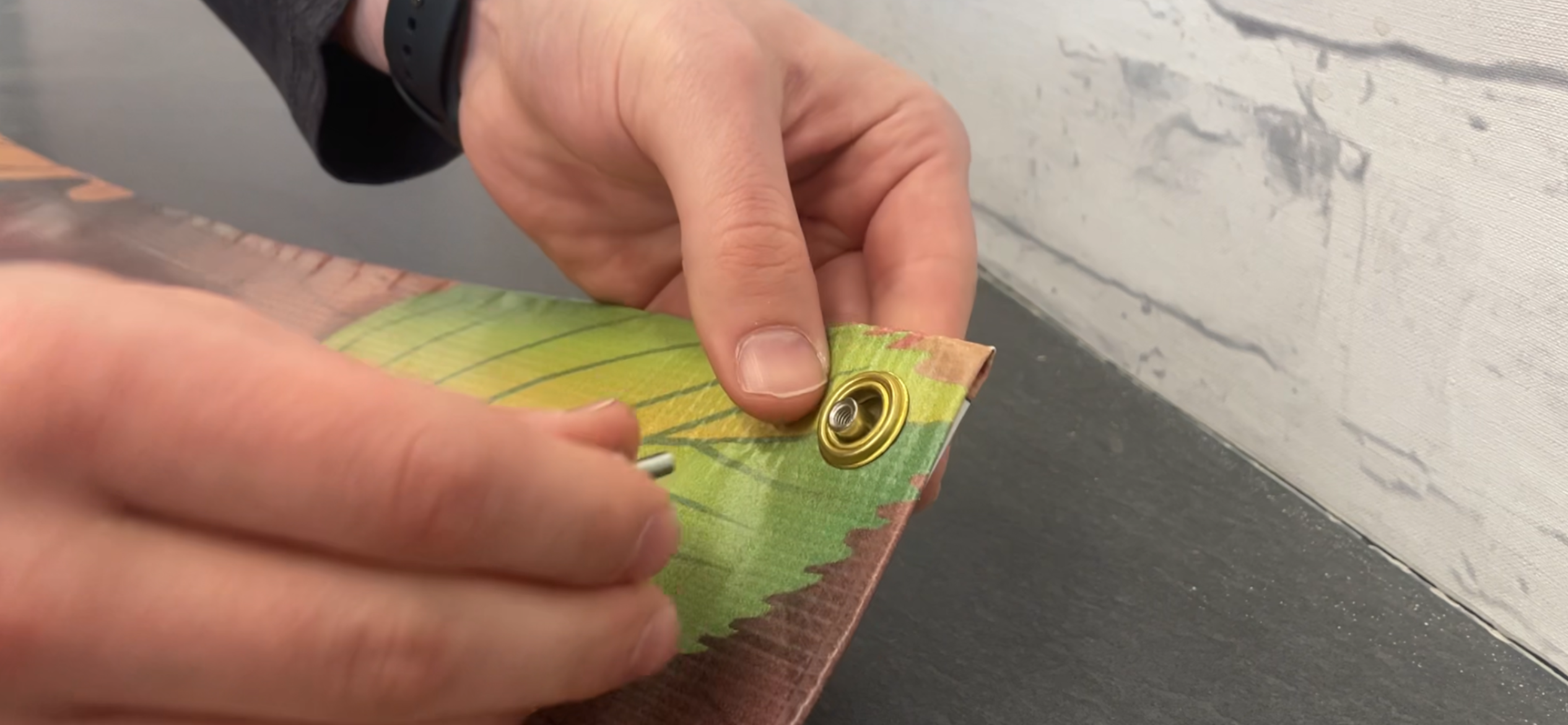 Hand Screwing In a Magnet